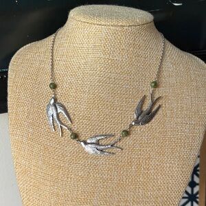 Silver Swallow Necklace with Green Bead Accents